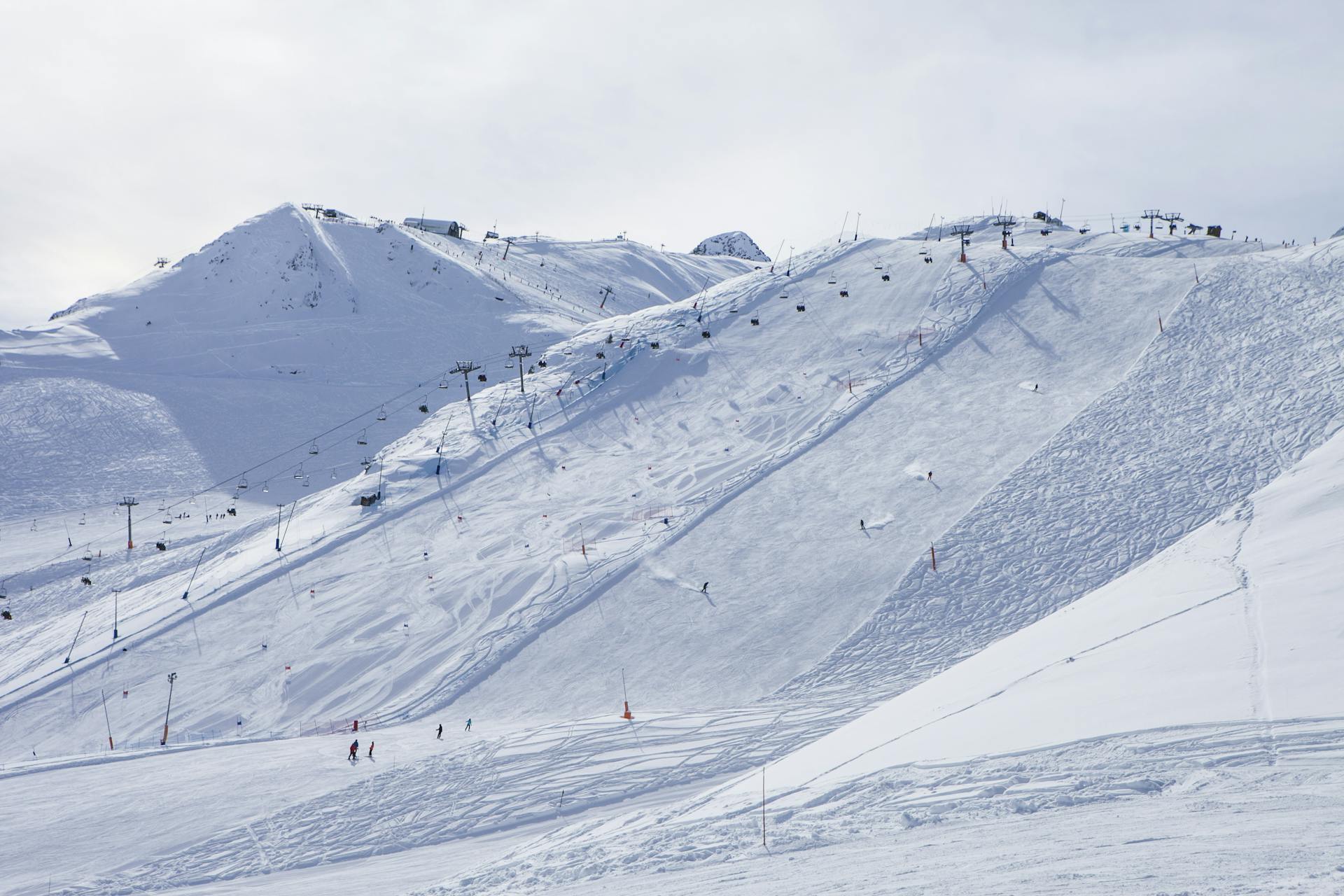 Skiiers enjoying groomed slopes of Pas De La Casa